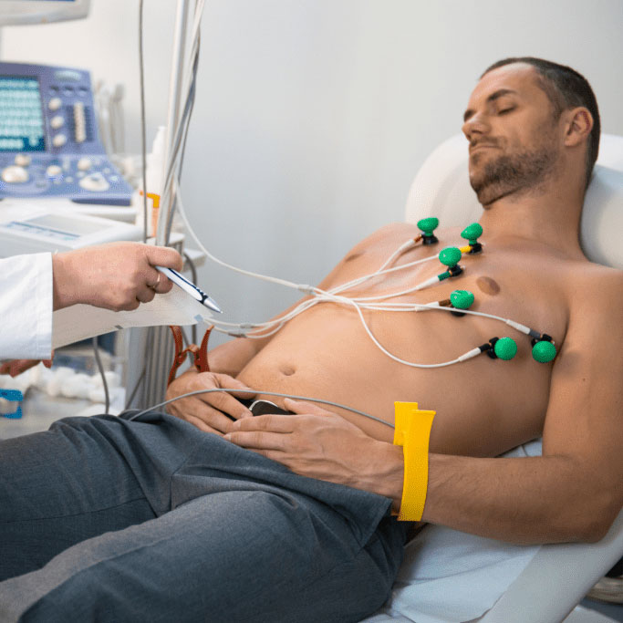 Patient suffering from fainting and dizziness getting an ECG test at a Winnipeg walk-in clinic